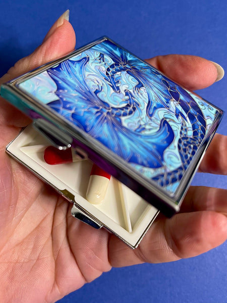 Blue dragon square pill box for, pocket, handbag, purse or desk drawer. Opens to reveal four sections for dividing pills. Also make a great jewellery box for small stud earings and hoops.