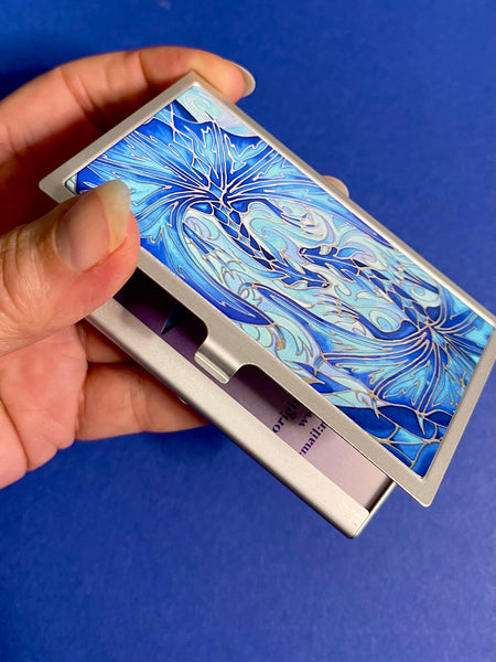 Blue dragon business card holder, pocket, handbag, briefcase, purse or desk drawer. Opens to reveal space to fit your introduction cards. Also make a great containers for carrying credit cards.