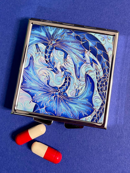 Blue dragon square pill box for, pocket, handbag, purse or desk drawer. Opens to reveal four sections for dividing pills. Also make a great jewellery box for small stud earings and hoops.