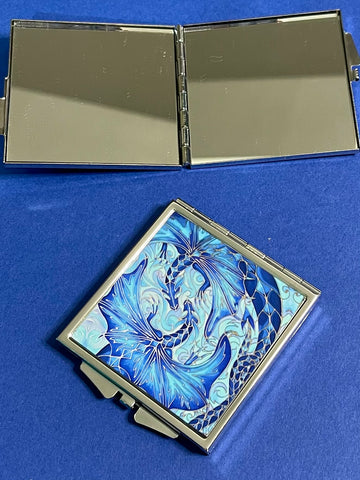 Blue dragon square mirror for, pocket, handbag, purse or desk drawer. Open the metal case to reveal two mirrors. Check your make up any time you need to.