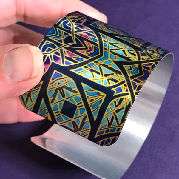 Cathedral Rose Window Bracelet in rich stained glass sunset colours- easy wear lightweight aluminium.