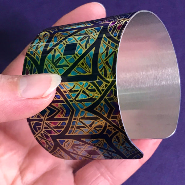 Cathedral Rose Window Bracelet in rich stained glass sunset colours- easy wear lightweight aluminium.