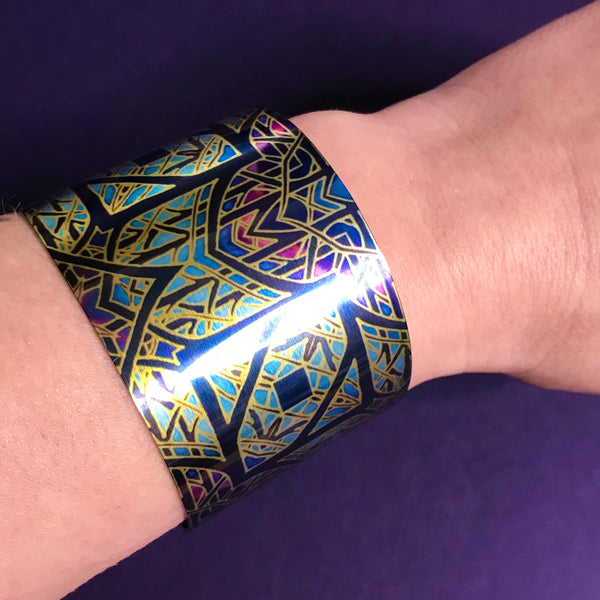 Cathedral Rose Window Bracelet in rich stained glass sunset colours- easy wear lightweight aluminium.