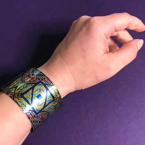 Cathedral Rose Window Bracelet in rich stained glass sunset colours- easy wear lightweight aluminium.