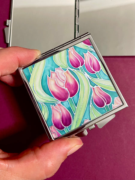 Pretty Pink Tulips Handbag Mirror - Pink and Green Flowers Compact Square Folding Pocket Makeup Mirror Gift for Her. present for Mum, Auntie, teacher, friend, daughter. metal case featuring pink tulip design on front with two mirrors inside.