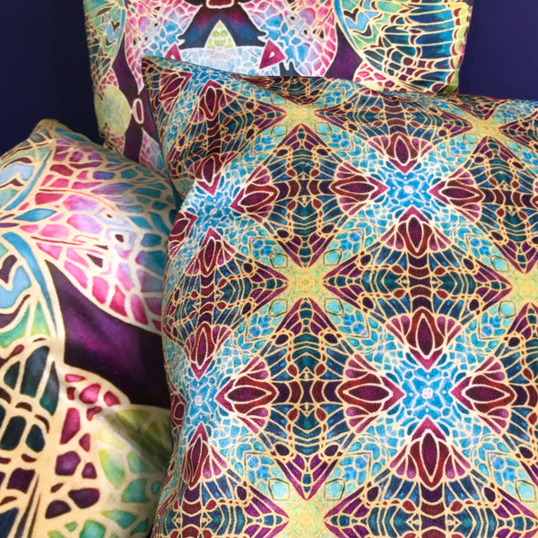 Teal Green & Red Diamond Repeat Pattern Kaleidoscope Cushions in Luxury Velvet